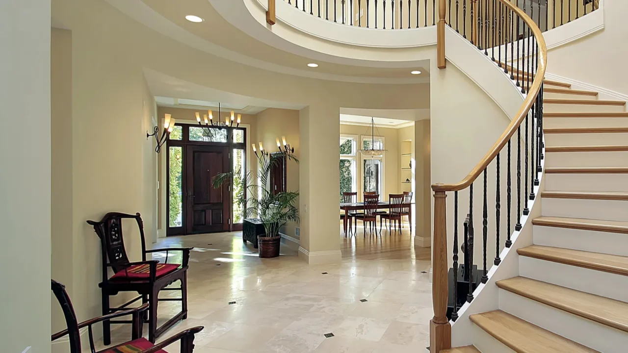 foyer with curved staircase