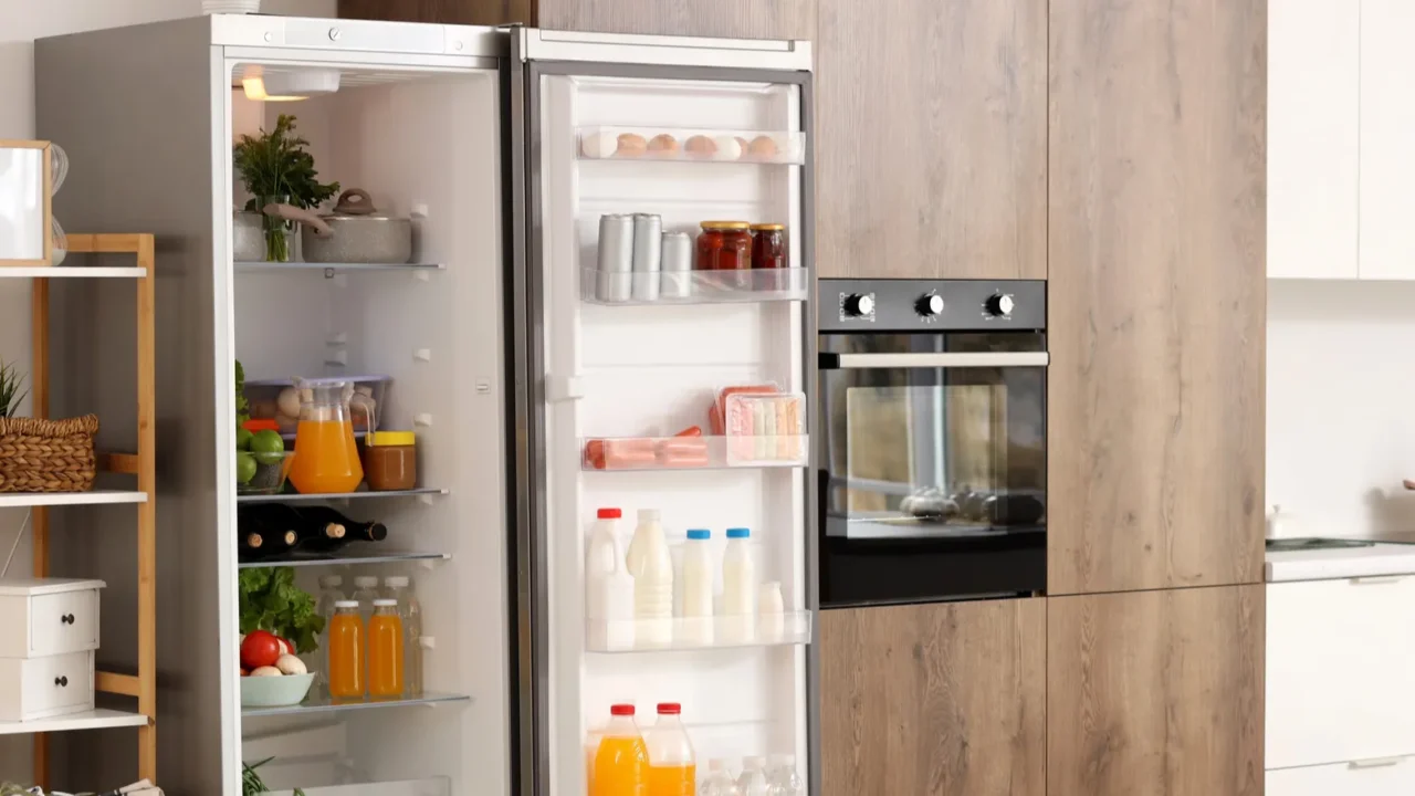 fridge full of different fresh products in kitchen