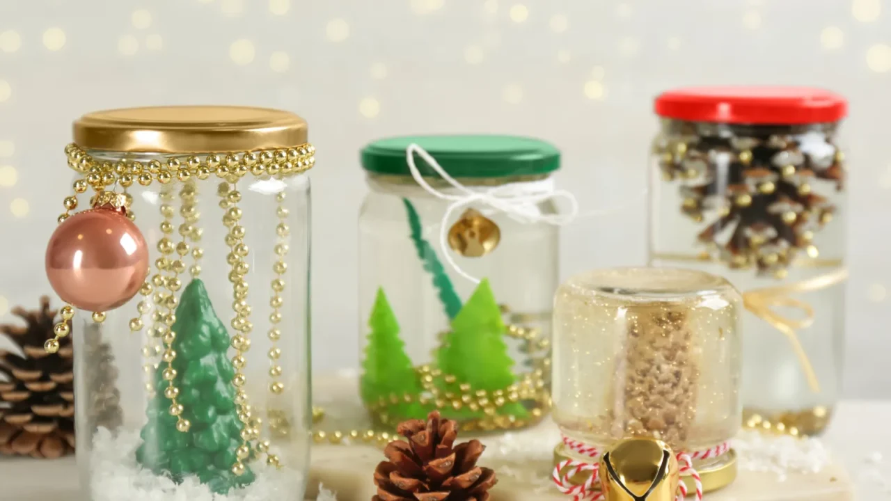 handmade snow globes and fir cones on light table