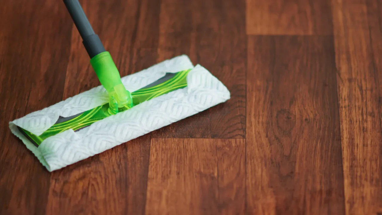 household time closeup on mop and floor in the modern