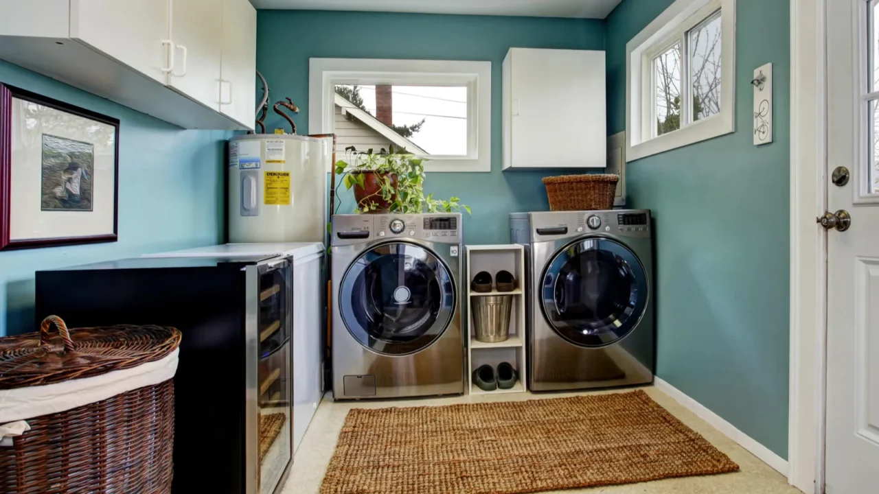 laundry room with modern steel appliances