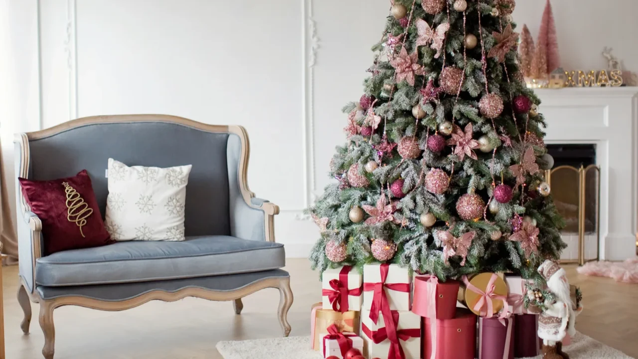 light christmas interior with grey sofa and christmas tree cozy