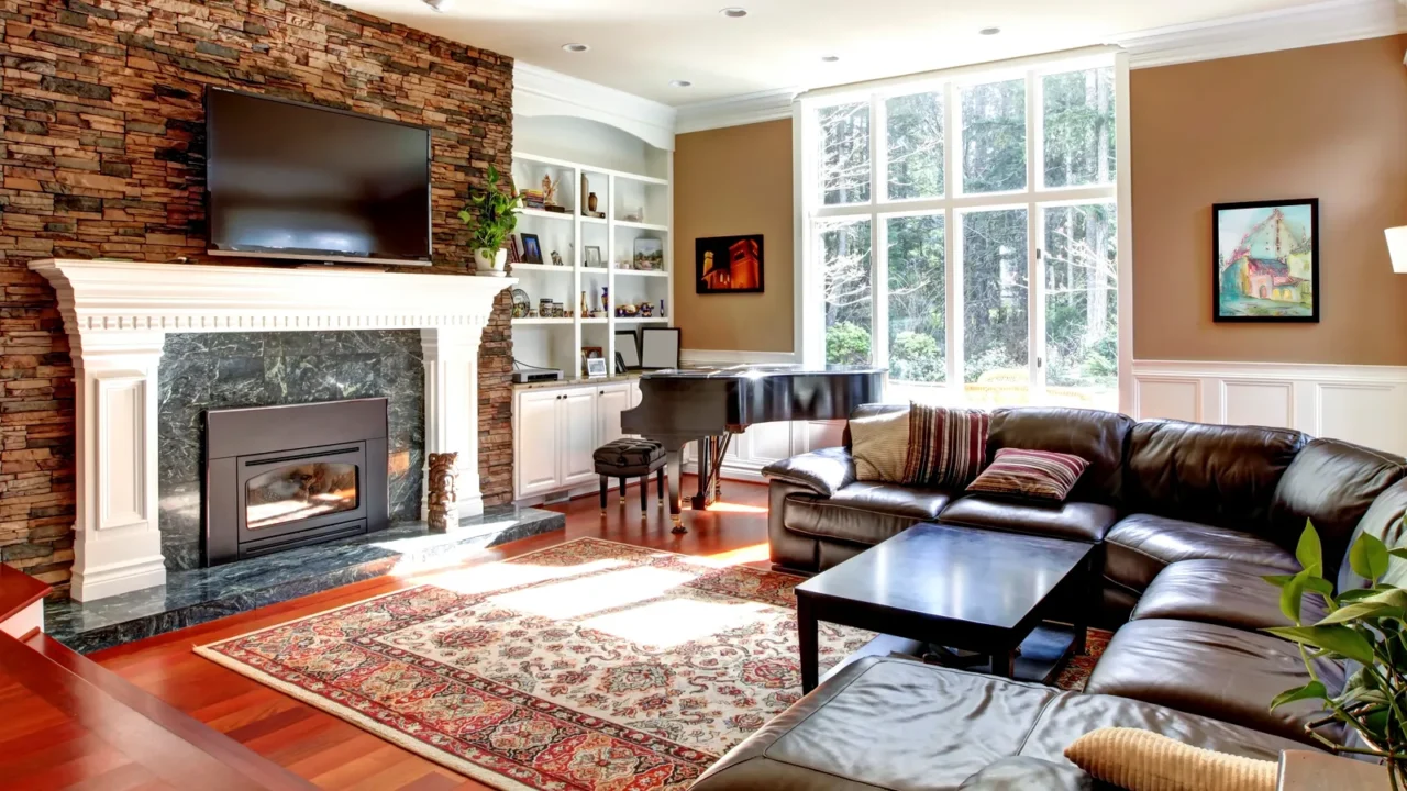 luxury living room with stobe fireplace and leather sofas