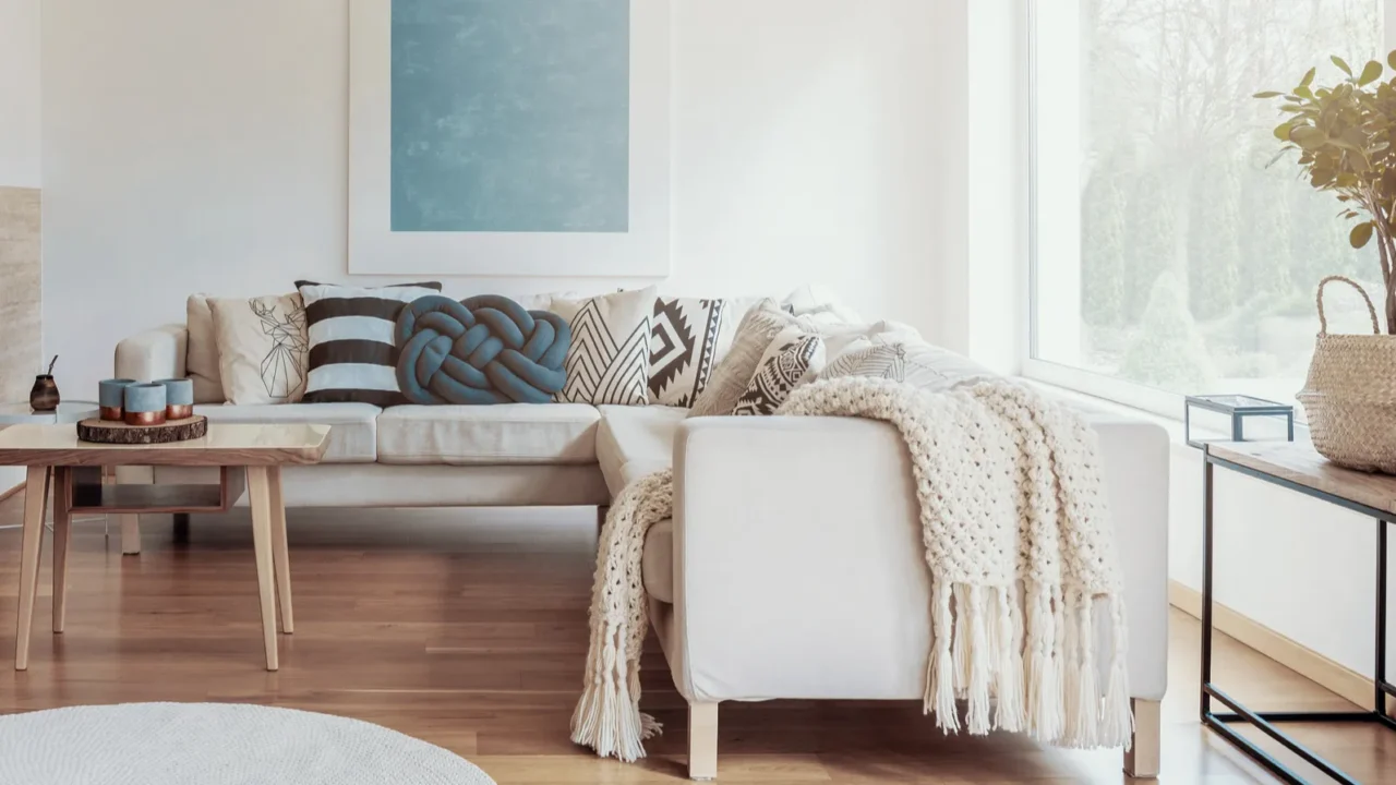 modern corner fireplace in a sunny peaceful living room interior