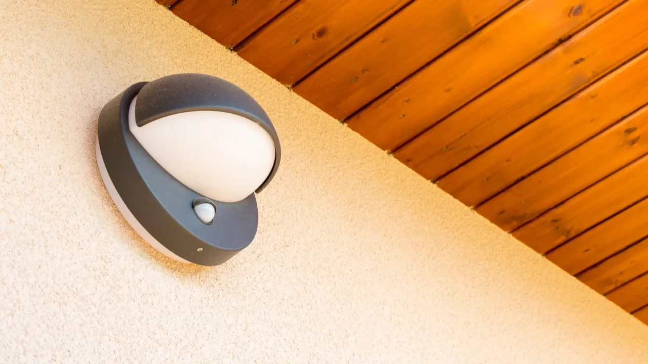 modern wall lamp with motion and light sensor on the