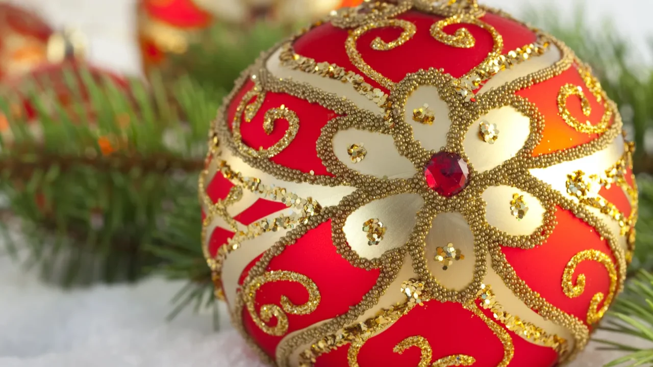 red christmas baubles and spruce tree