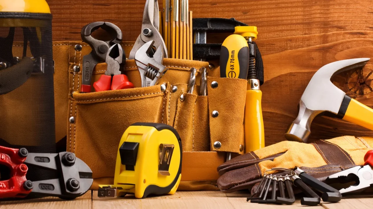 set of working tools on wooden boards