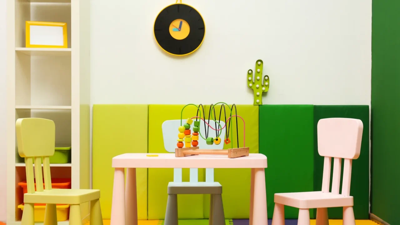 stylish playroom interior with table and chairs