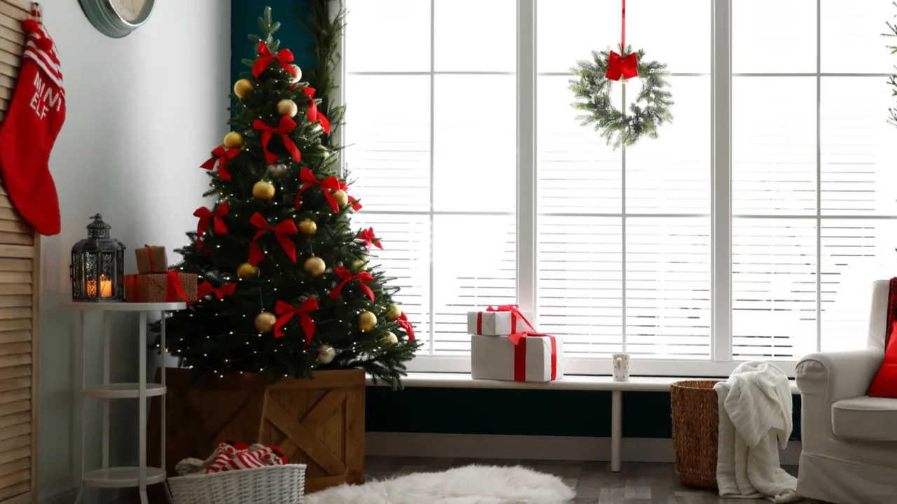 stylish room interior with decorated christmas tree