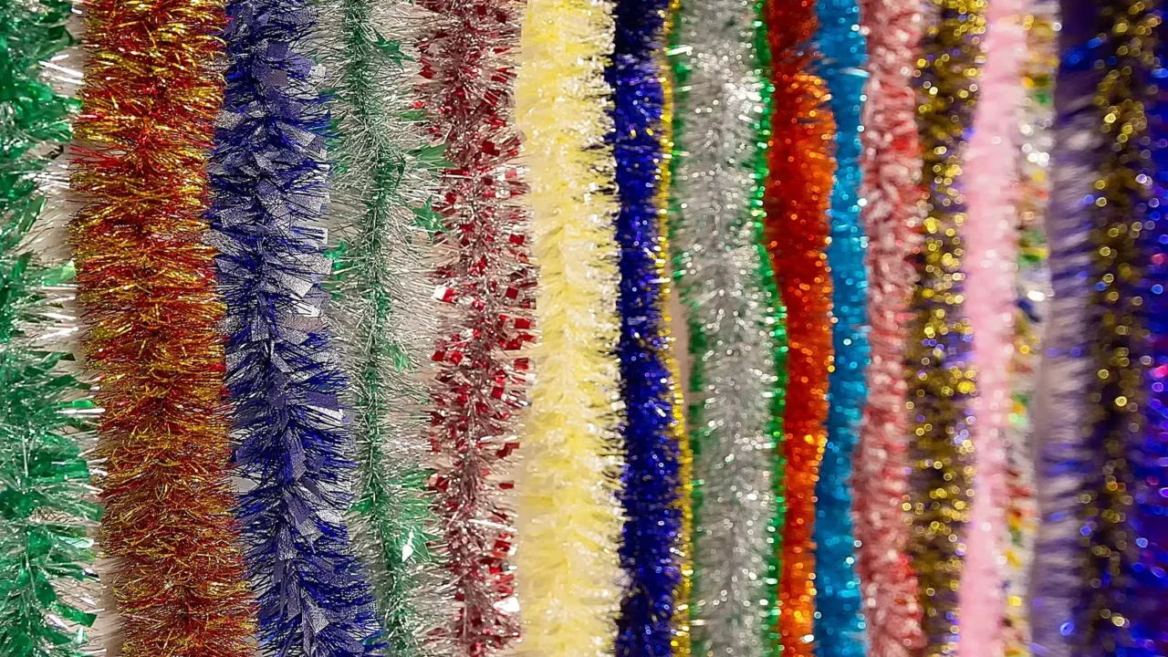 varicoloured decorative ornaments for christmas on a store window christmas