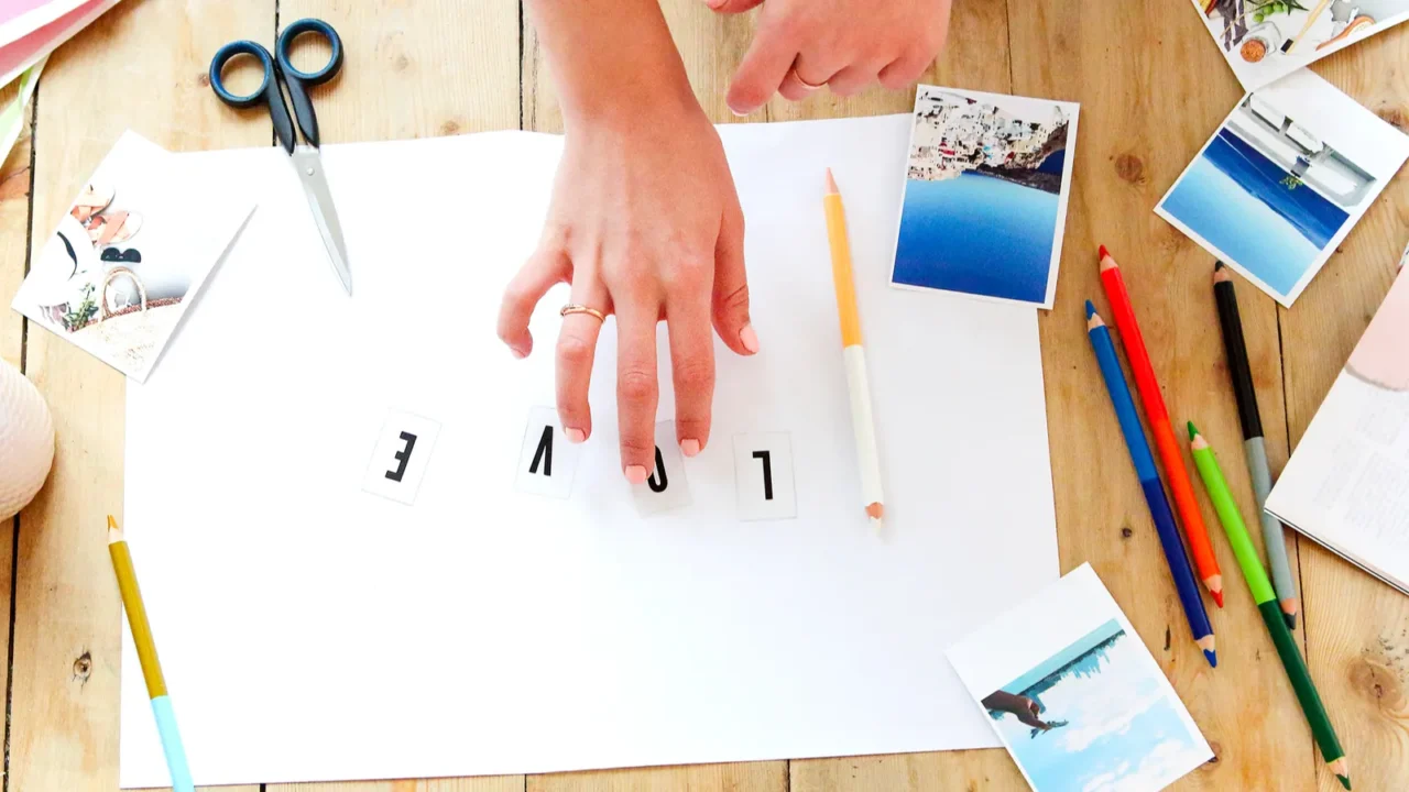 young brunette woman creating her feng shui wish map using