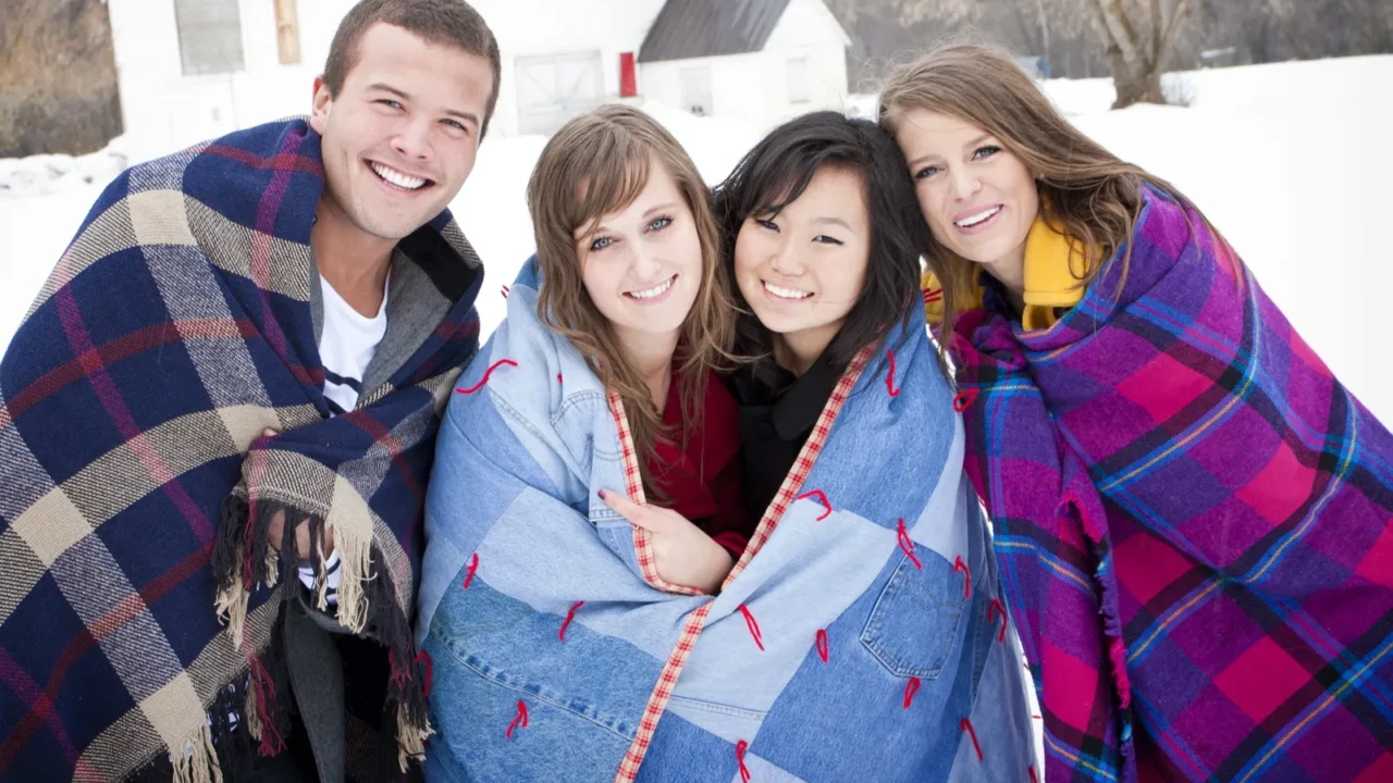 young friends bundle up