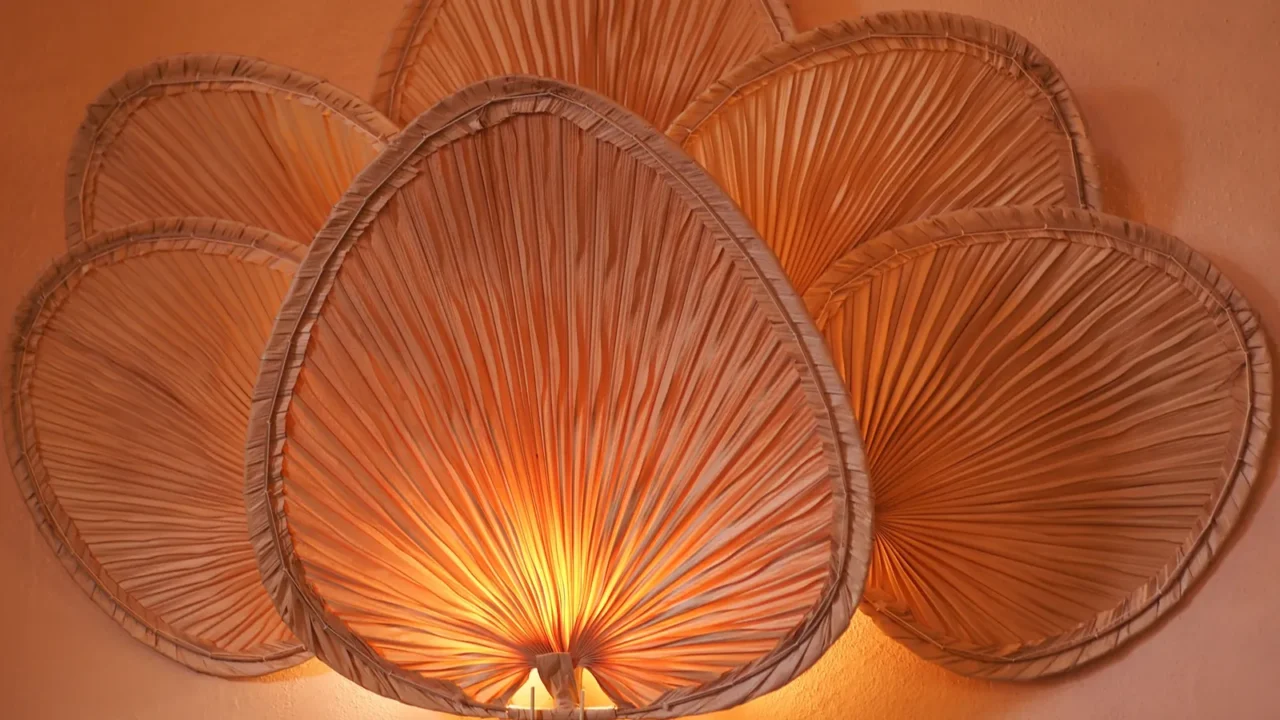 a stylish rattan wall lamp with a unique leaf design