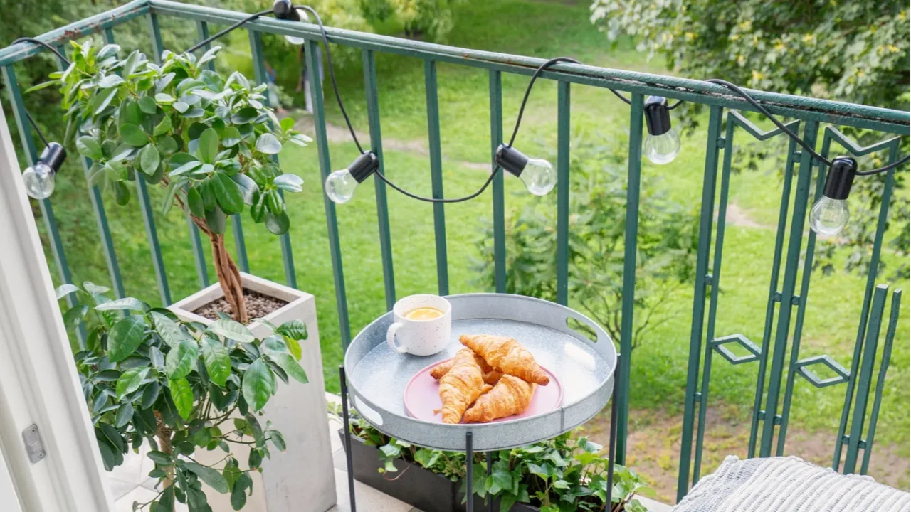 beautiful space for meal and relaxation on a green balcony