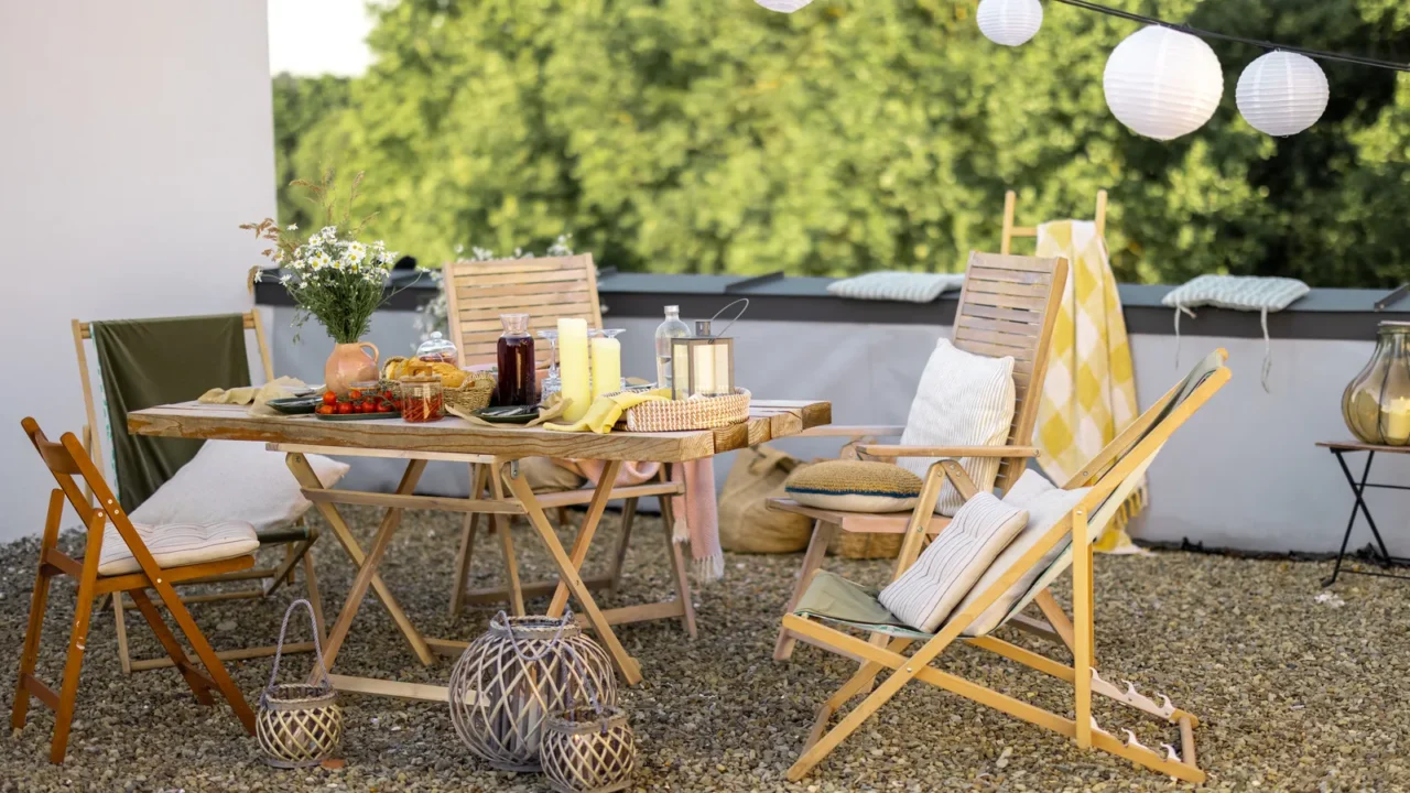 beautifully decorated roof terrace with a dining table