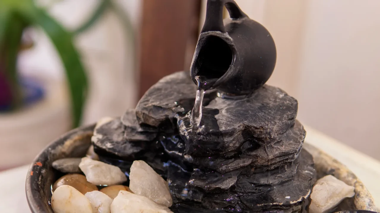 close view of a decorative zen water fountain next