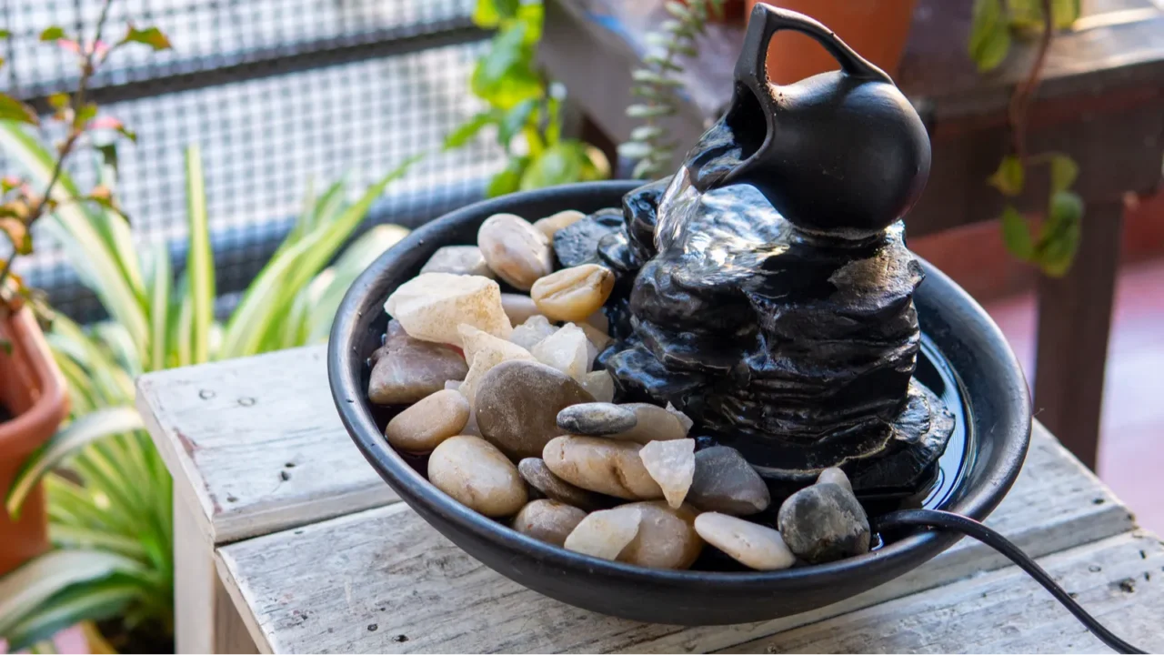 close view of a decorative zen water fountain next to