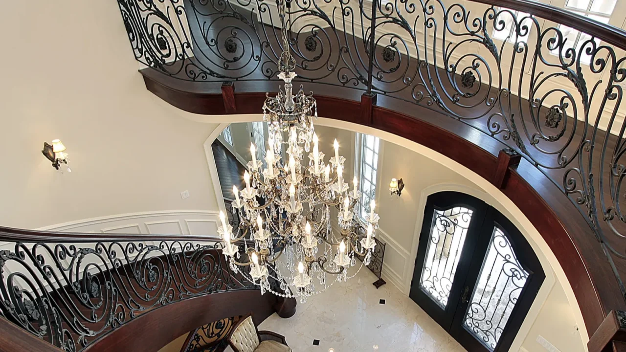 curved stairway leading down into foyer