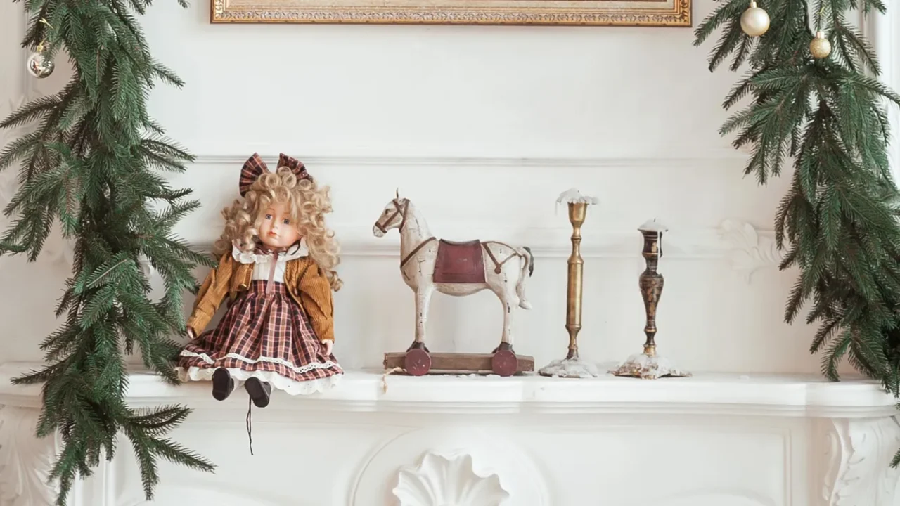 decorations on the christmas fireplace in the form of candlesticks