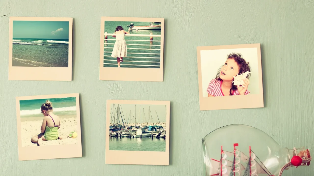 Different travel polaroids attached on the bedroom wall.