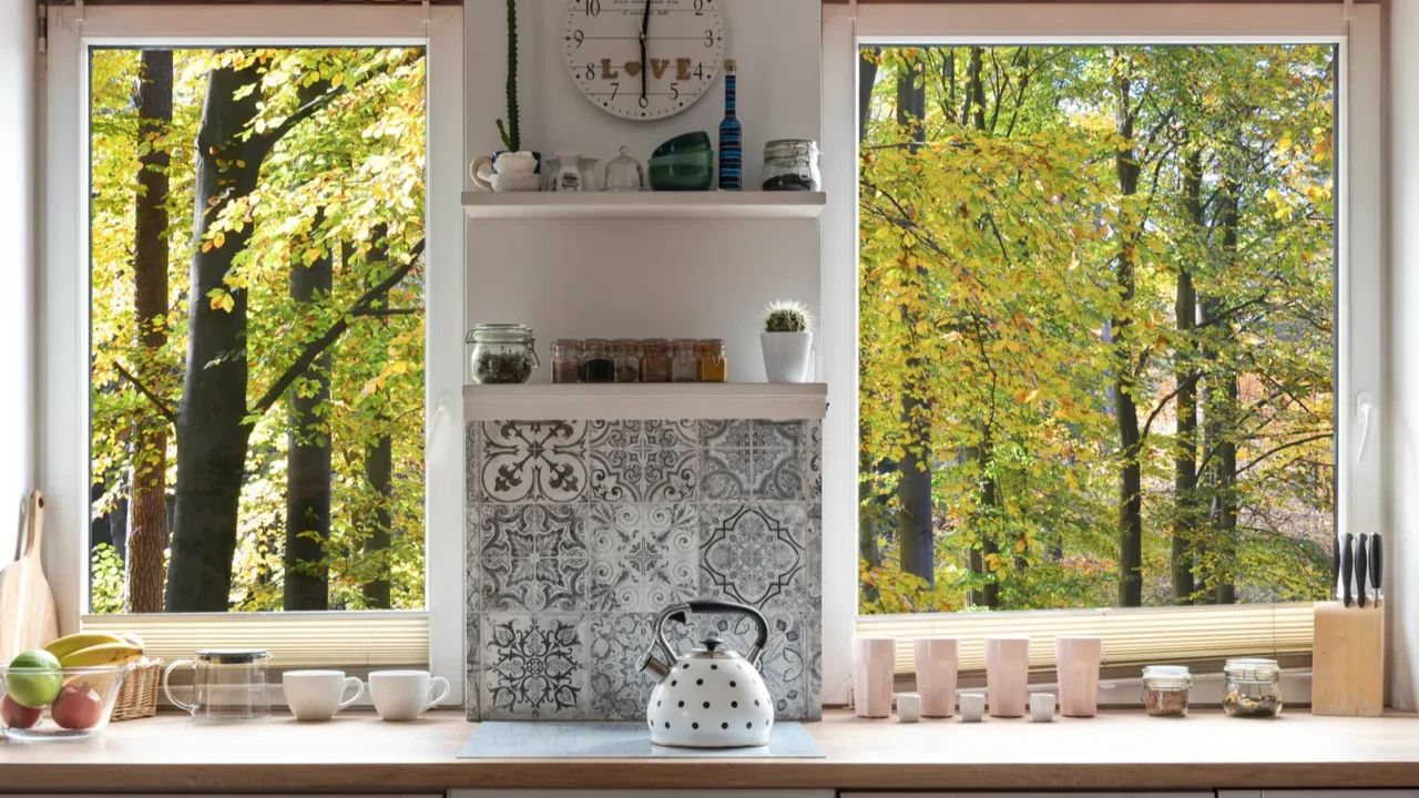 interior of kitchen with view from window on forest white