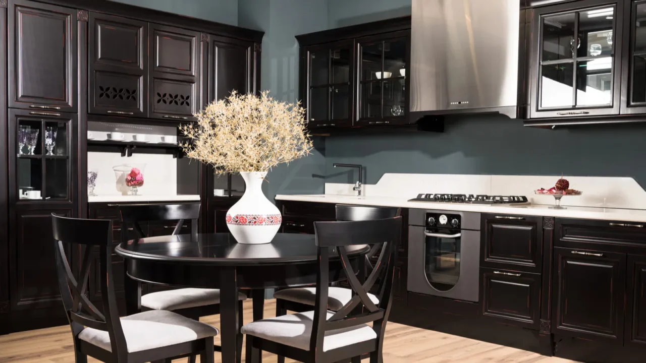 interior of modern kitchen and dining room with black wooden