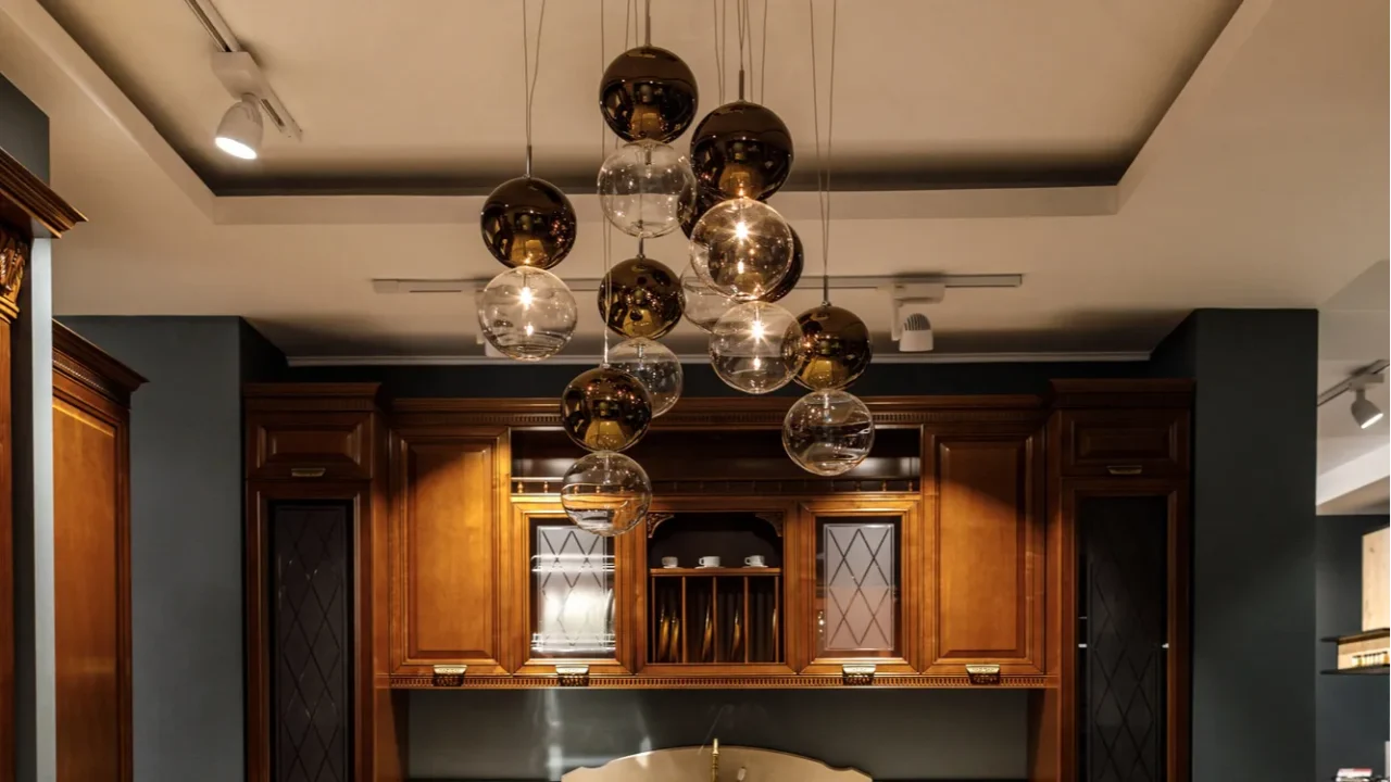 interior of modern kitchen with chandelier and counter