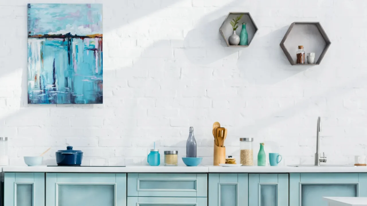 interior of turquoise and white elegant kitchen with kitchenware decor