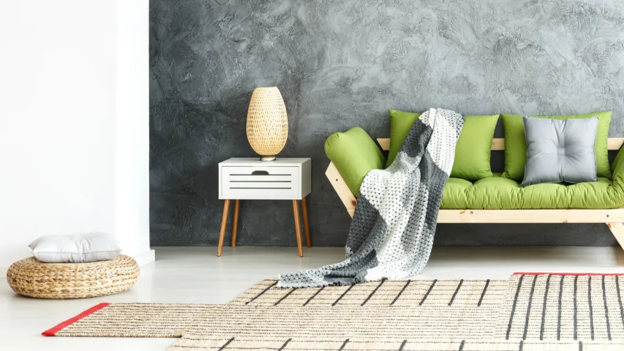 knitted blanket on wooden sofa