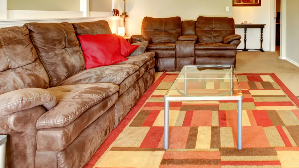 living room interior with green walls red and brown colored