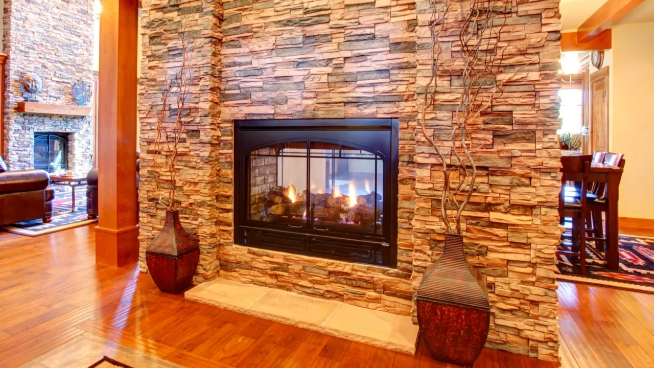 luxury house interior stone wall with fireplace