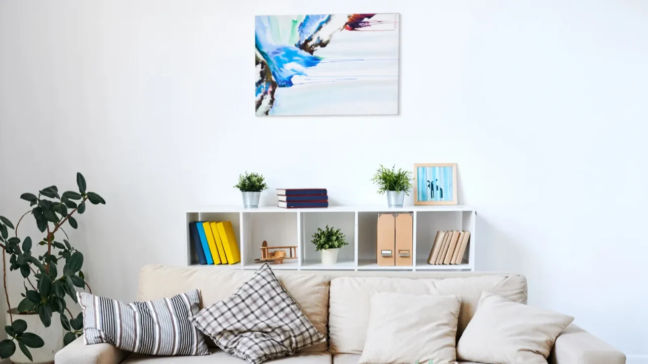 modern interior of living room with abstract picture and certificates