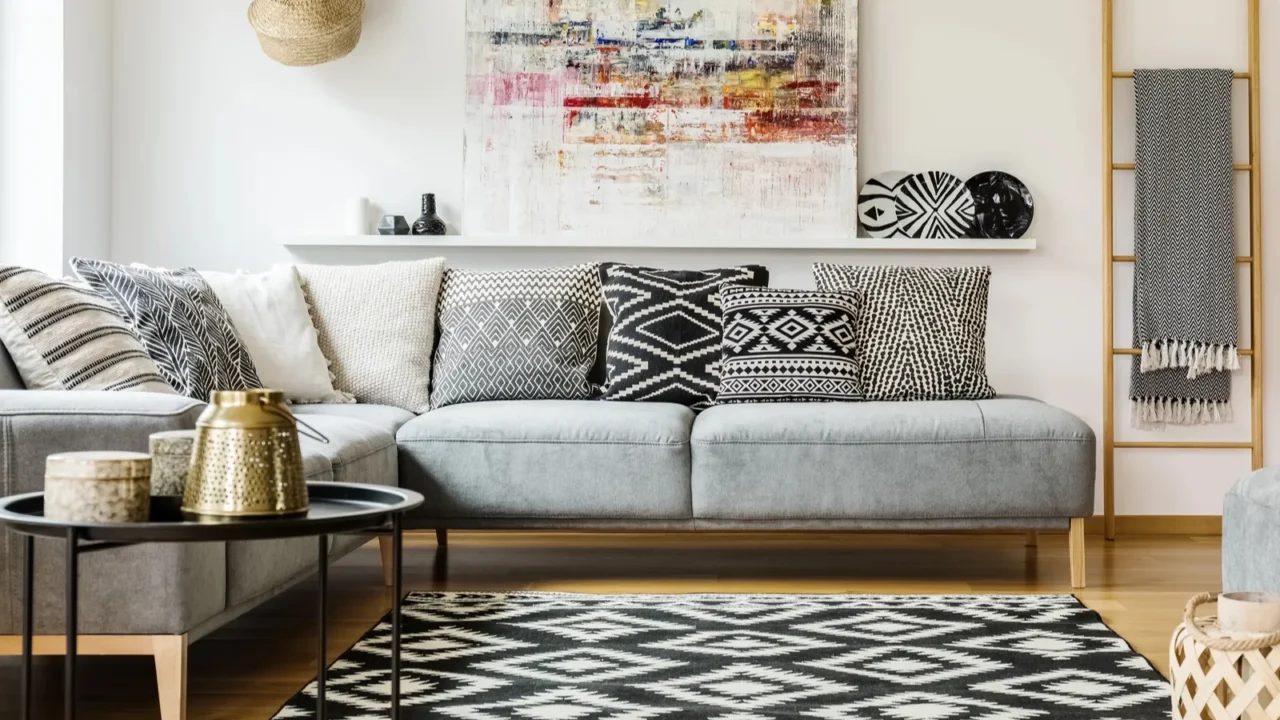 patterned carpet in decorative living room interior with painting above