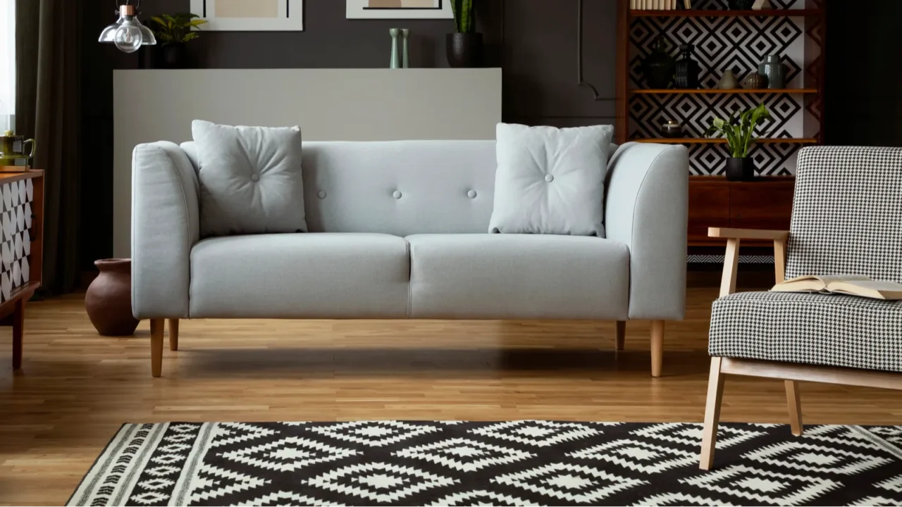 real photo of dark grey living room interior with posters