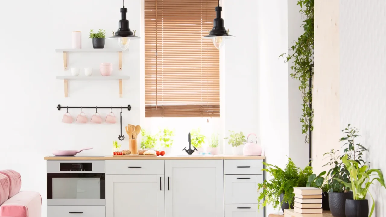 real photo of open space kitchen interior with checkerboard floor