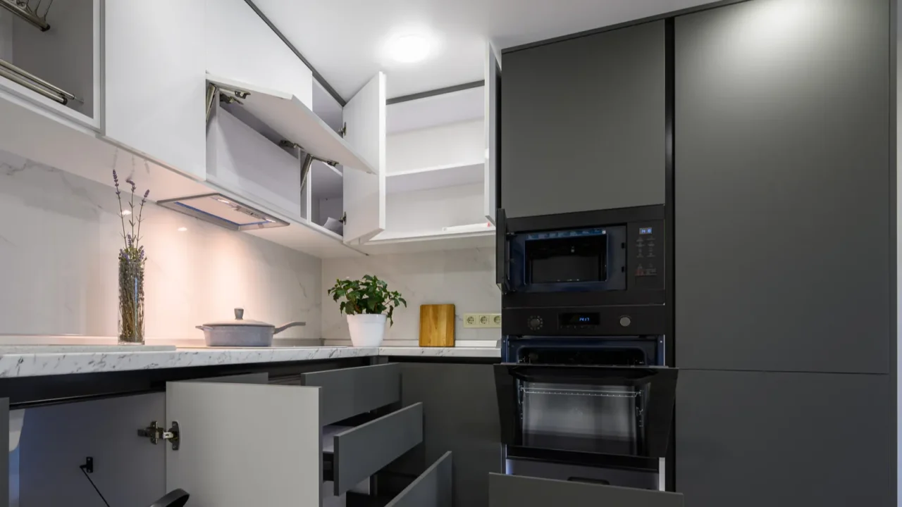 showcase interior of modern simple dark grey and white kitchen