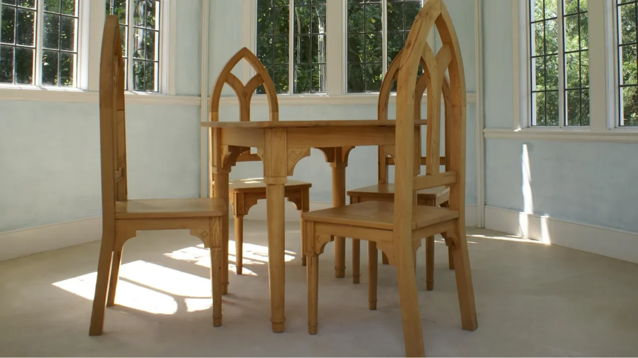 table and chairs in an old summerhouse