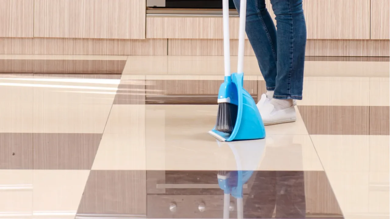 young female contractor doing housework