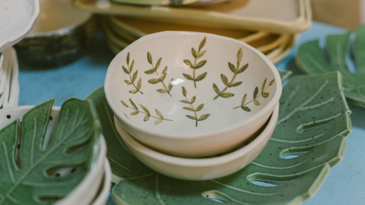 Handmade clay bowls with leaves pattern on them.