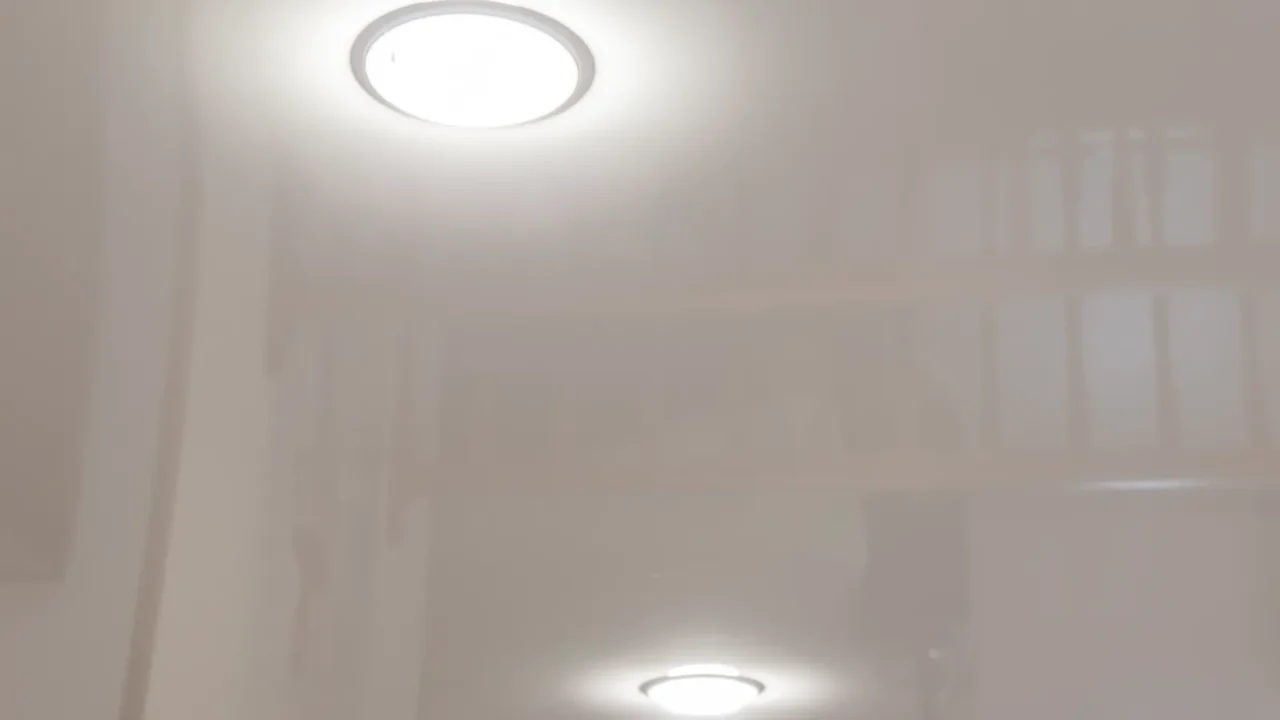 builtin led ceiling lights on a glossy stretch ceiling