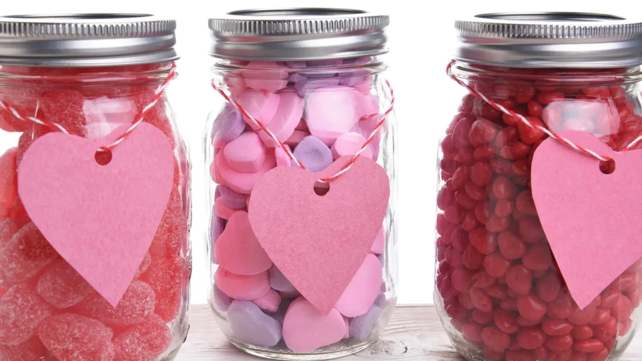 canning jars filled with candy hearts and for valentines day