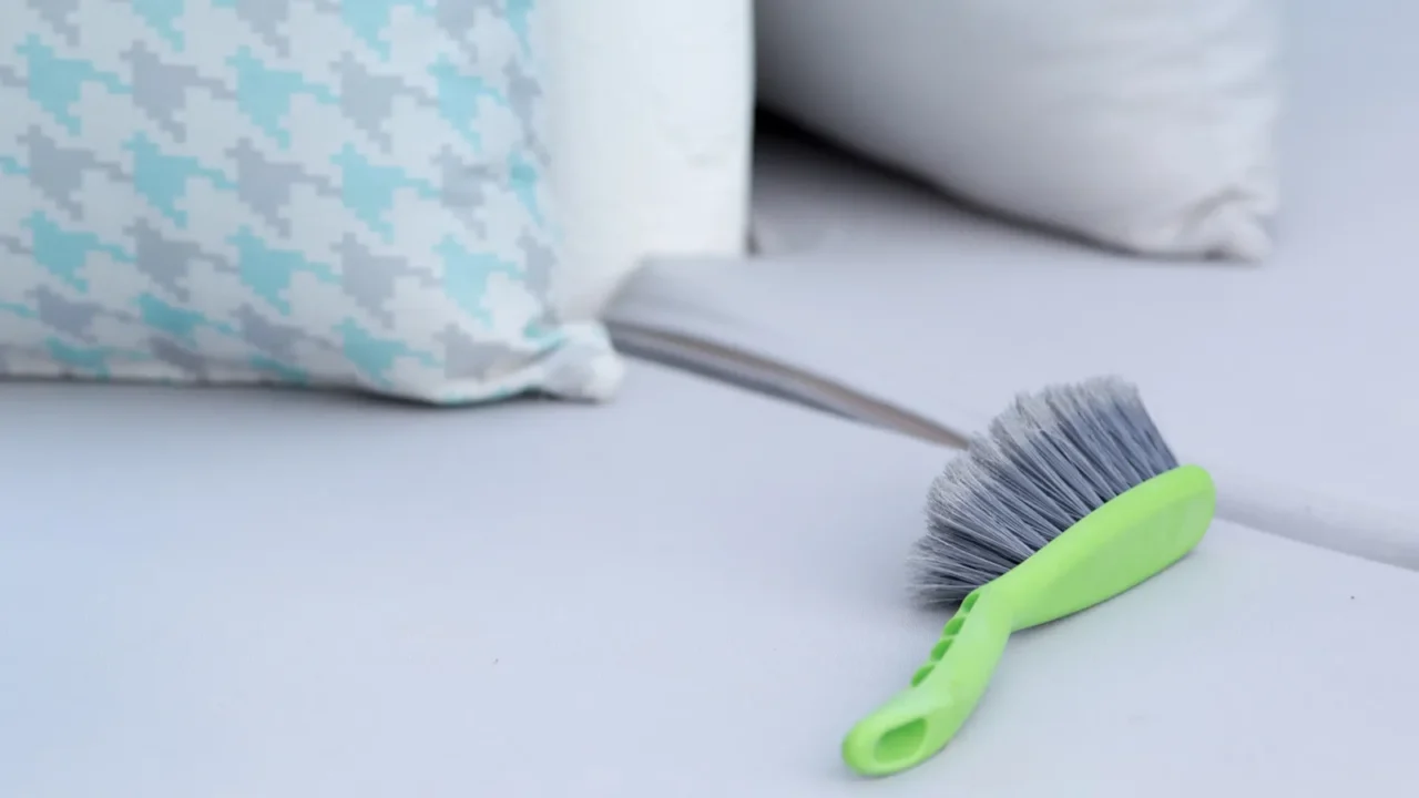 cleaning brush on outdoor furniture