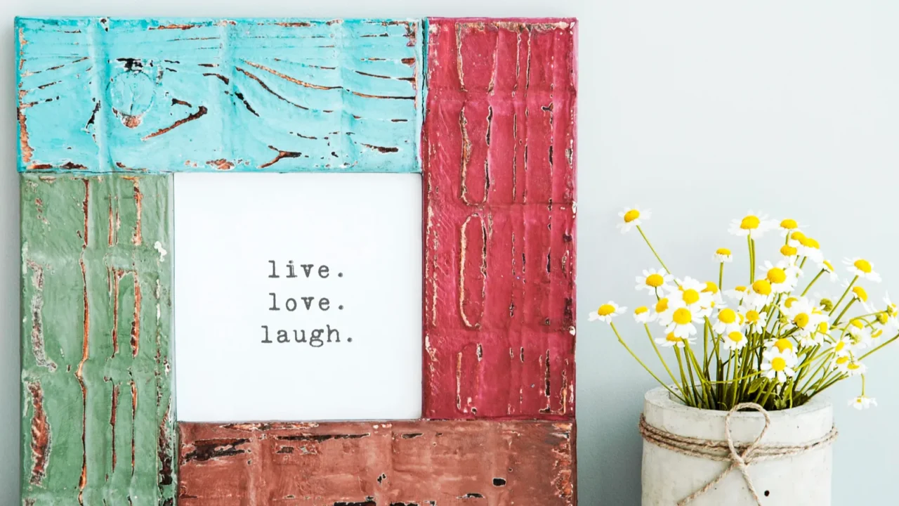 colored red gree blue frame with chamomile live love laugh