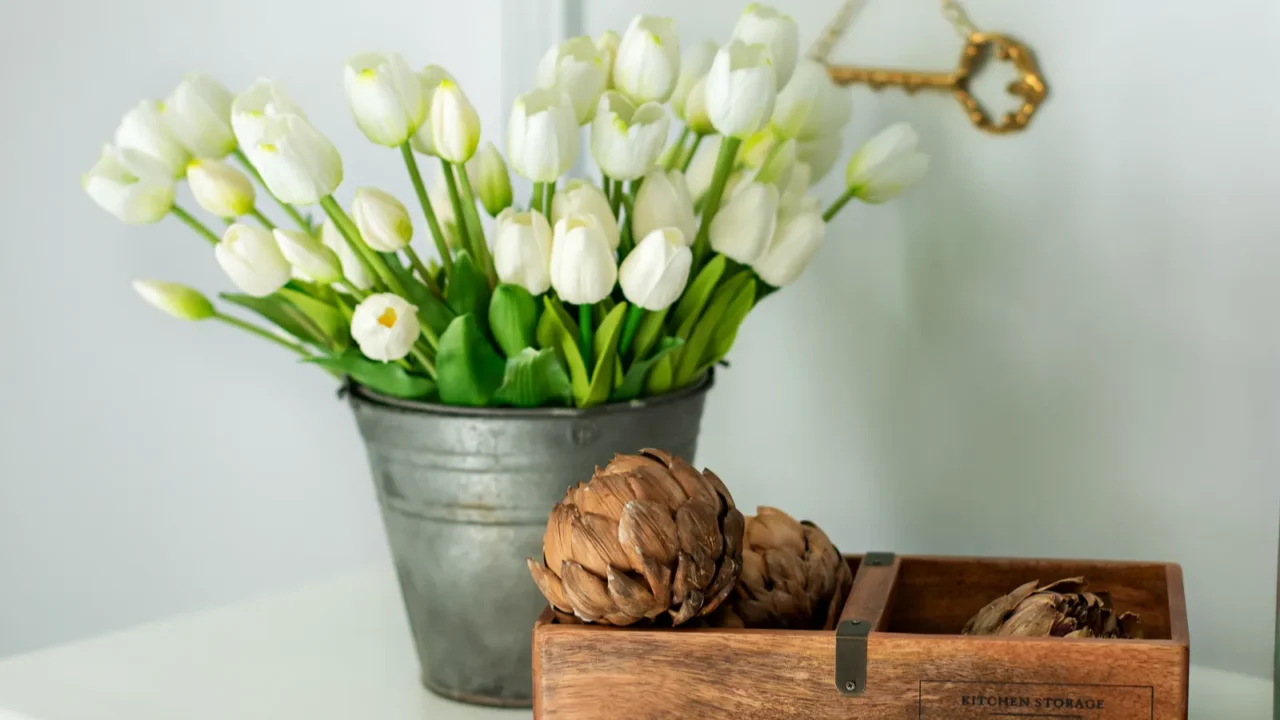 composition of dried artichoke flowers in wooden box and a