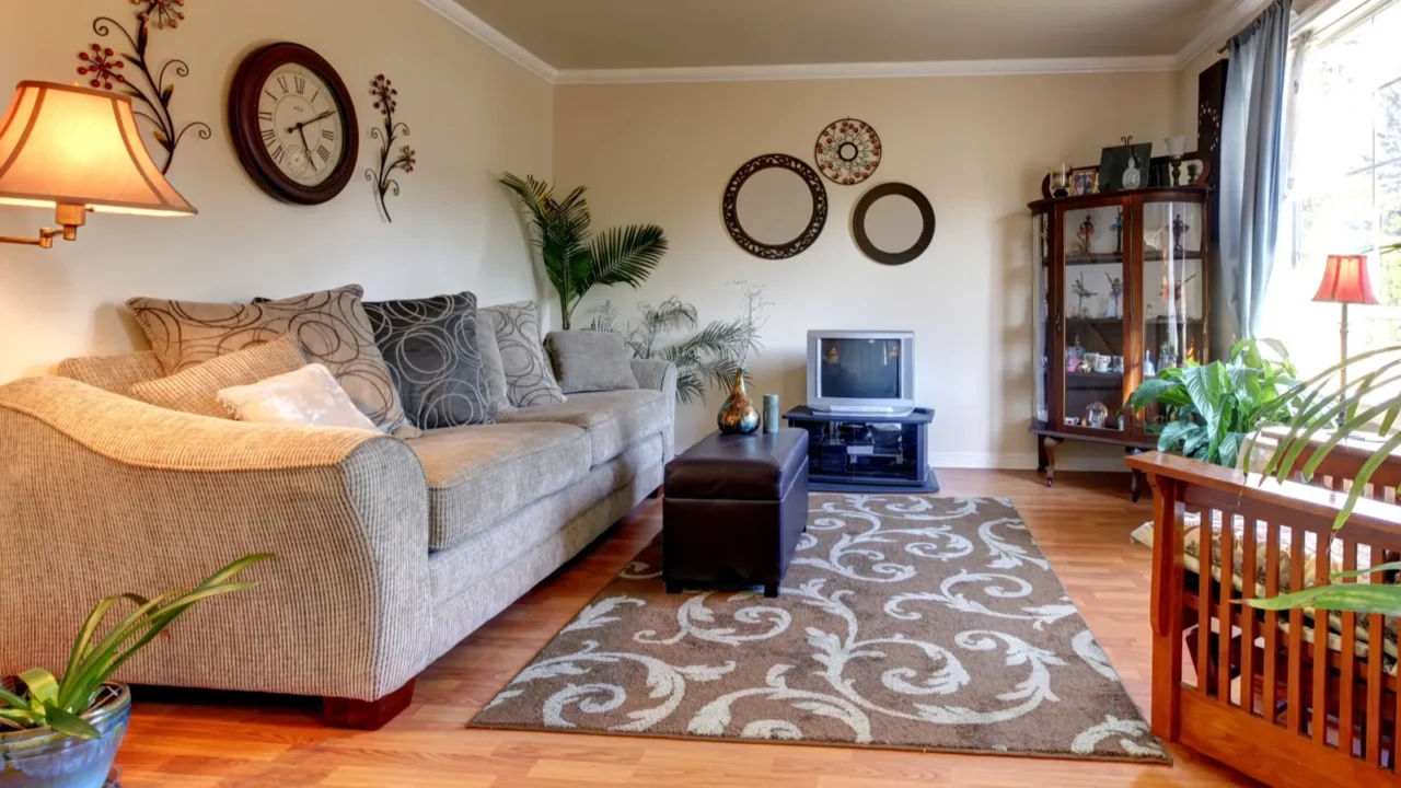 elegand beige living room with blue and old small tv