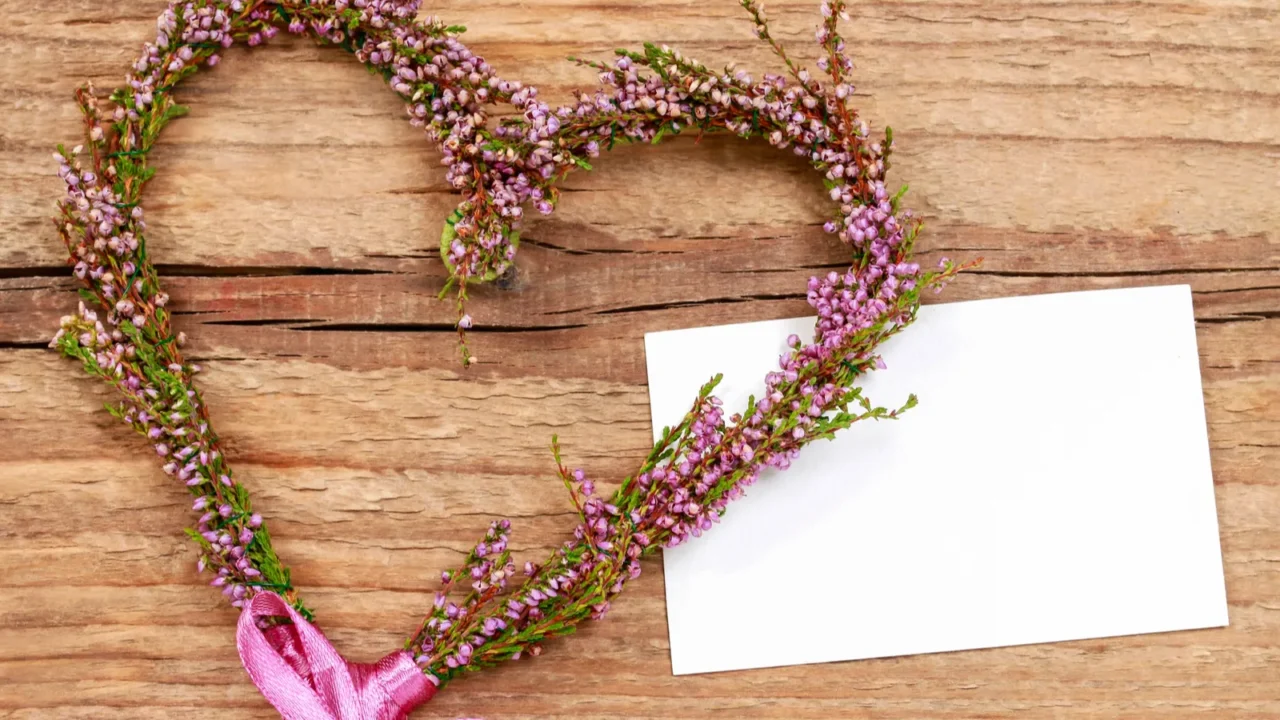 florist at work steps of making heather erica door wreath