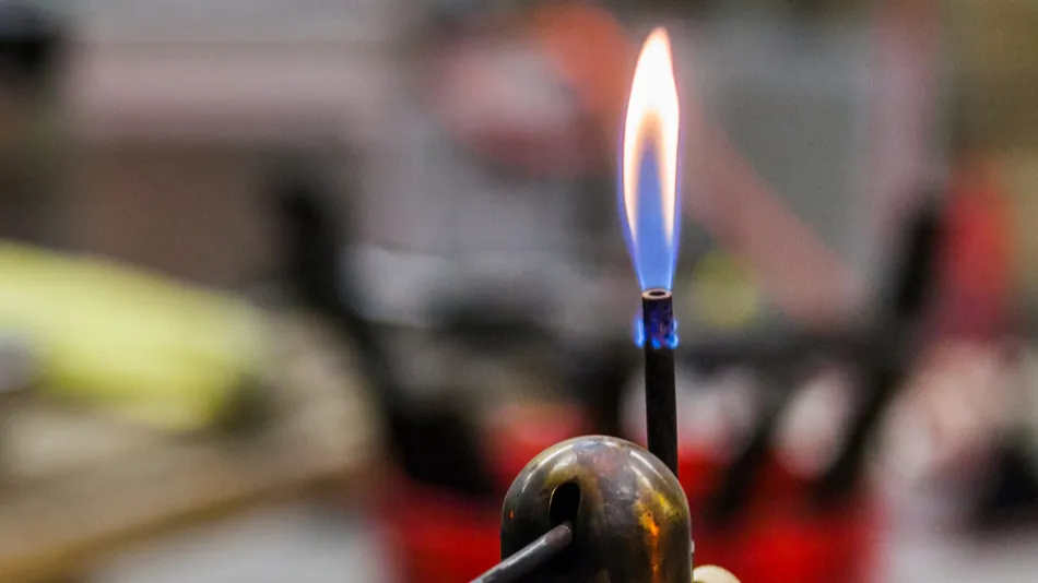 glassblowing work place and torch pilot flame