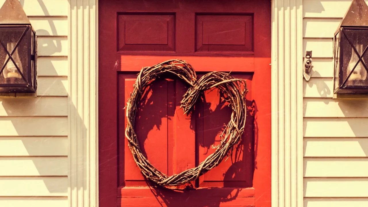 heart shaped wreath on red door