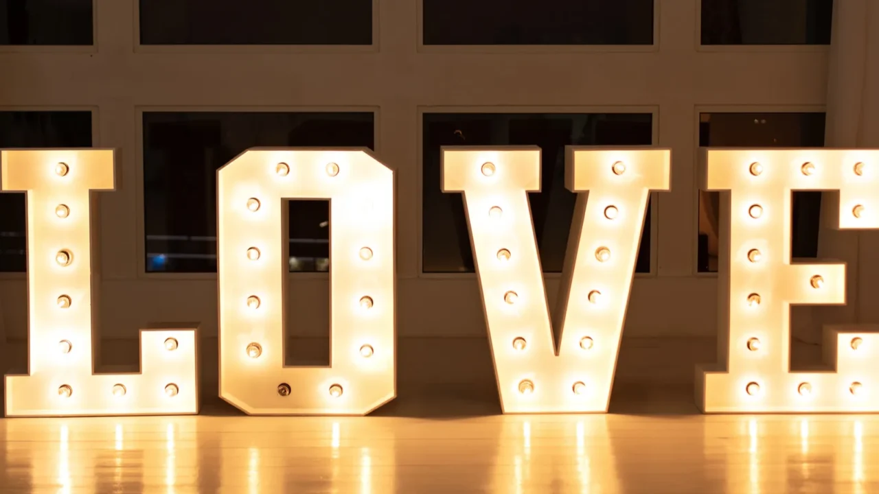 love big white letters with led retro bulbs glowing word