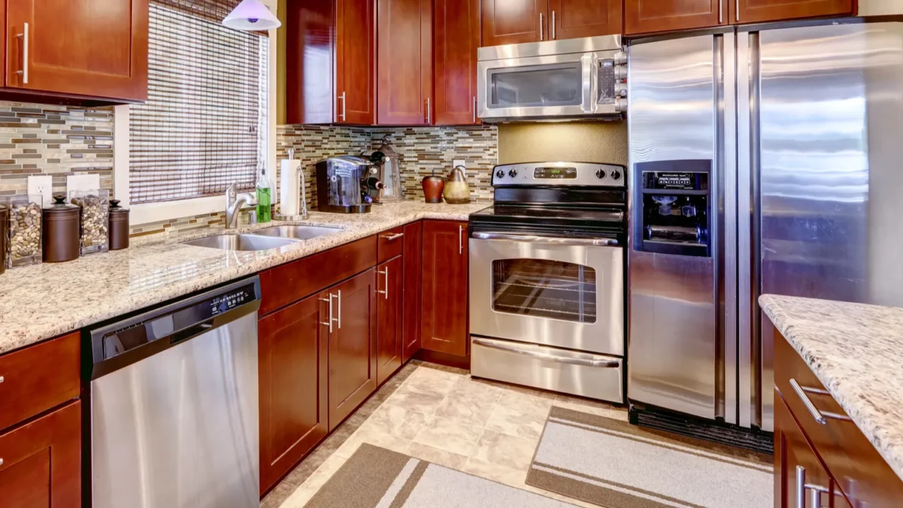 modern kitchen interior with mosaic back splash trim and granite